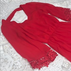 Red back strap floral design sleeves